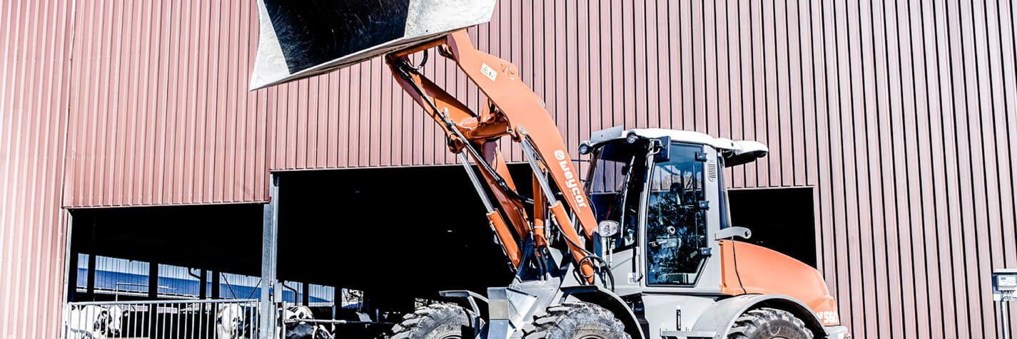 Pyöräkuormaaja Weycor AR560 kauha ylhäällä
